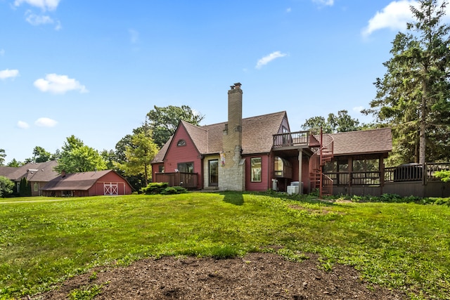 600 W Bloomingdale Rd, Itasca, IL 60143 - back of house featuring a deck, a chimney, a lawn, roof with shingles, and stairs