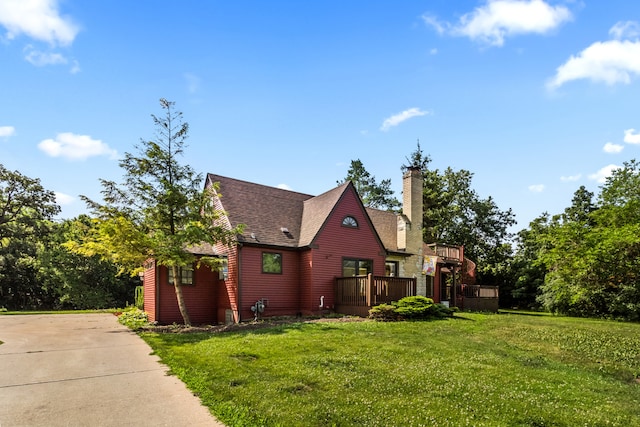 600 W Bloomingdale Rd, Itasca, IL 60143 - view of property exterior with a chimney, a lawn, roof with shingles, and a deck