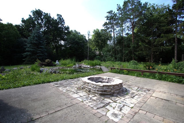 600 W Bloomingdale Rd, Itasca, IL 60143 - view of patio featuring an outdoor fire pit