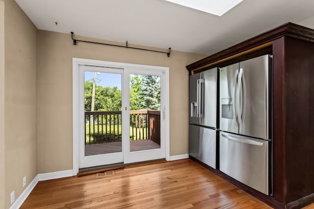 600 W Bloomingdale Rd, Itasca, IL 60143 - doorway to outside featuring light wood finished floors