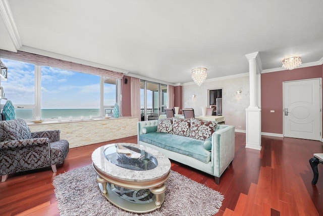 1300 N Lake Shore Dr Unit 10B, Chicago, IL 60610 - living area featuring decorative columns, crown molding, wood finished floors, a water view, and a chandelier