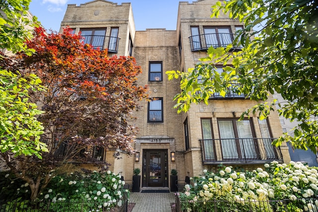 1475 W Winona St Unit 2, Chicago, IL 60640 - view of front of house featuring brick siding