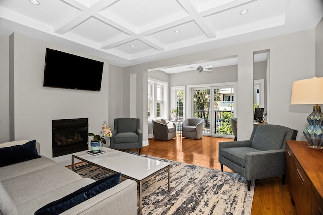 1475 W Winona St Unit 2, Chicago, IL 60640 - living room featuring coffered ceiling, wood finished floors, recessed lighting, a glass covered fireplace, and ceiling fan