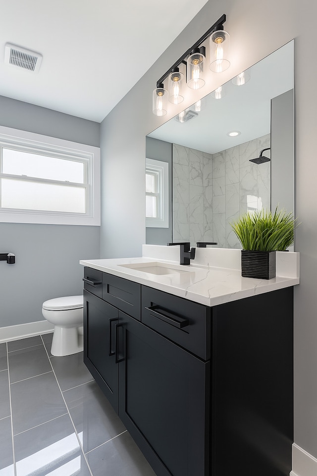 18506 Martin Ave, Homewood, IL 60430 - full bathroom featuring vanity, a tile shower, and tile patterned floors