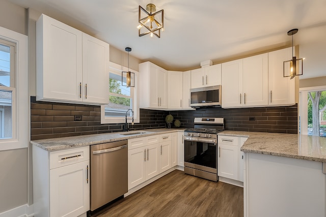 18506 Martin Ave, Homewood, IL 60430 - kitchen featuring appliances with stainless steel finishes, dark wood-style flooring, white cabinetry, and light stone counters