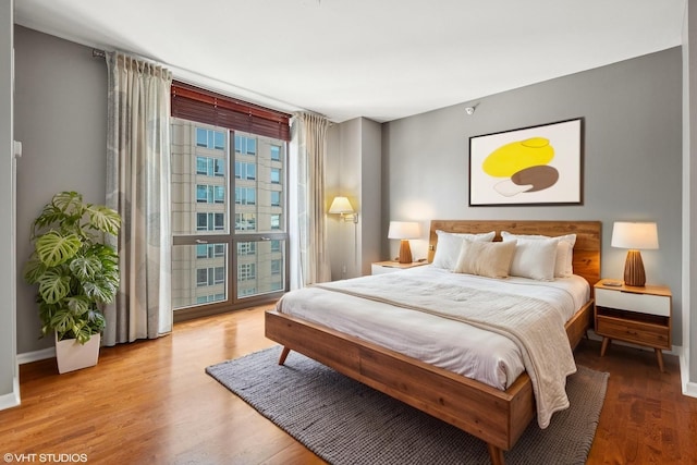 635 N Dearborn St Unit 2506, Chicago, IL 60654 - bedroom with wood finished floors and baseboards