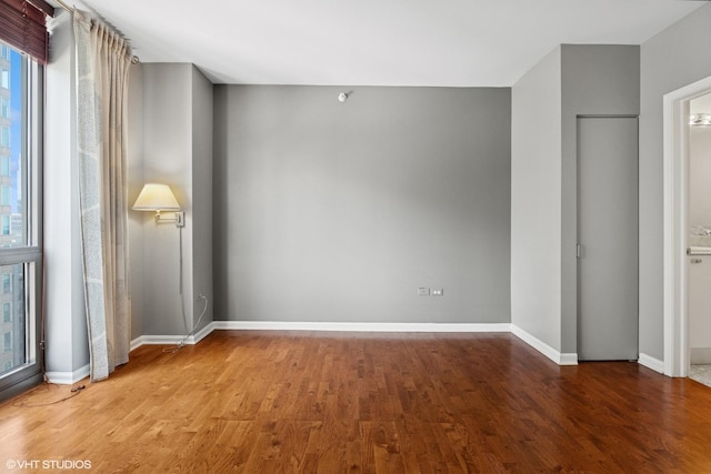 635 N Dearborn St Unit 2506, Chicago, IL 60654 - spare room with wood finished floors and baseboards