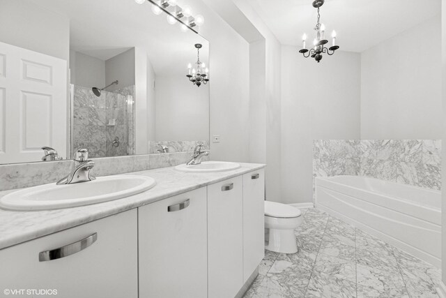 635 N Dearborn St Unit 2506, Chicago, IL 60654 - full bathroom featuring a chandelier, marble look tiles, double vanity, a bath, and a shower