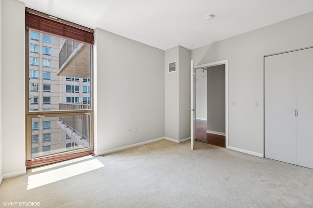 635 N Dearborn St Unit 2506, Chicago, IL 60654 - unfurnished bedroom featuring carpet flooring and a closet