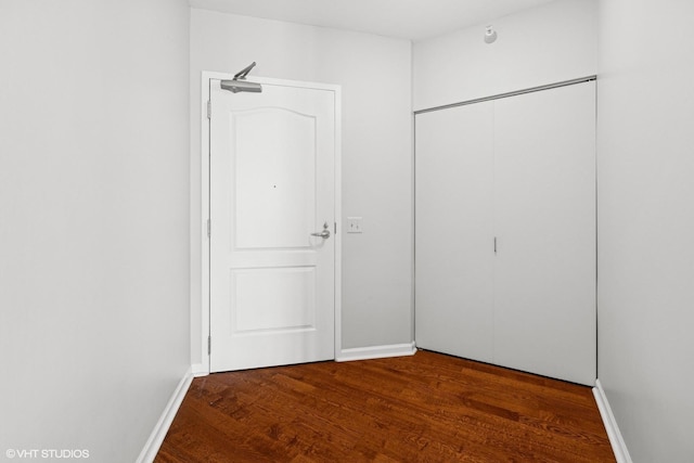 635 N Dearborn St Unit 2506, Chicago, IL 60654 - unfurnished bedroom with wood finished floors and a closet
