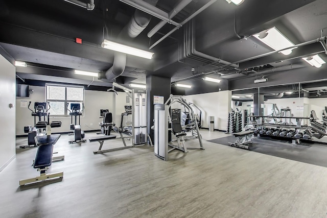 635 N Dearborn St Unit 2506, Chicago, IL 60654 - exercise room featuring wood finished floors and baseboards