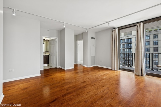 635 N Dearborn St Unit 2506, Chicago, IL 60654 - empty room featuring track lighting and wood finished floors