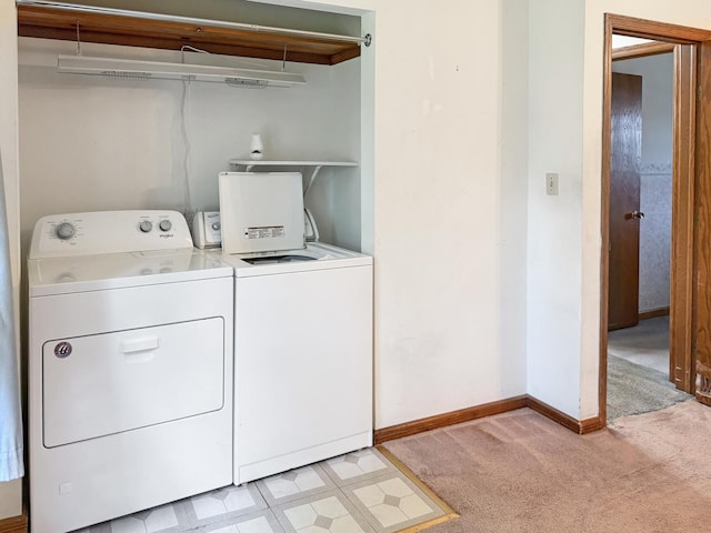 207 Southview Dr, Rochelle, IL 61068 - laundry room featuring washer and clothes dryer and light carpet
