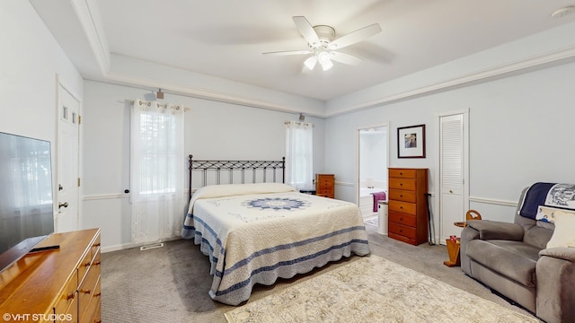 1513 Berwyn St, Spring Grove, IL 60081 - carpeted bedroom with ceiling fan and a tray ceiling