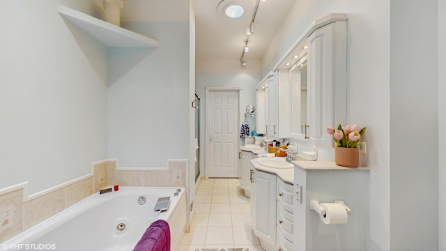 1513 Berwyn St, Spring Grove, IL 60081 - full bath featuring vanity, a whirlpool tub, and tile patterned flooring
