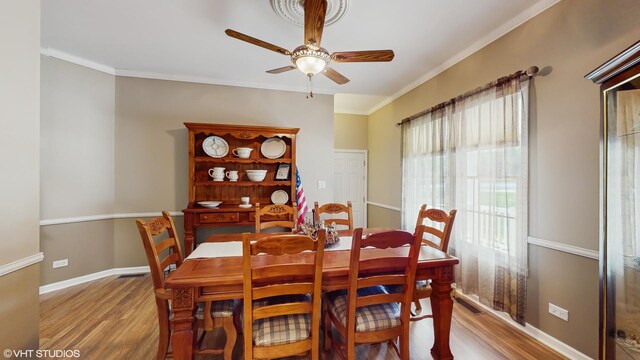 1513 Berwyn St, Spring Grove, IL 60081 - dining room featuring a ceiling fan, wood finished floors, and ornamental molding