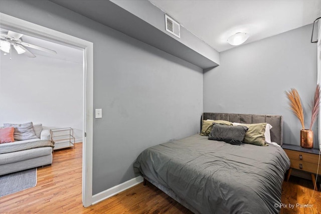 2233 W Shakespeare Ave Unit 1F, Chicago, IL 60647 - bedroom with wood finished floors and baseboards