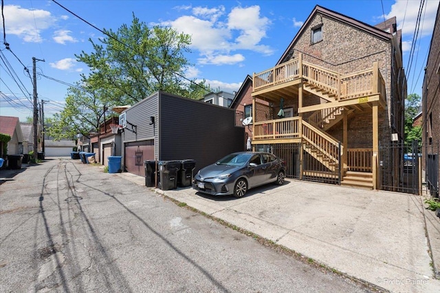 2233 W Shakespeare Ave Unit 1F, Chicago, IL 60647 - view of asphalt road featuring stairway
