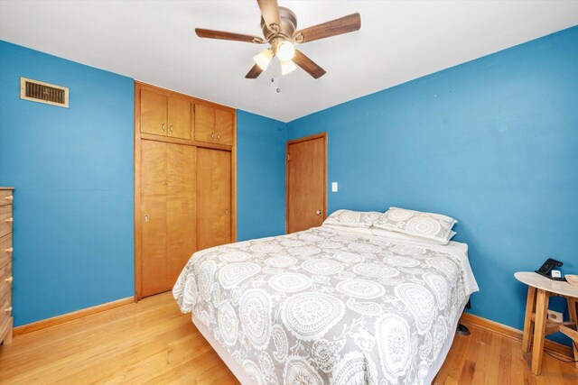 3820 Lombard Ave, Berwyn, IL 60402 - bedroom with light wood finished floors, a closet, and ceiling fan