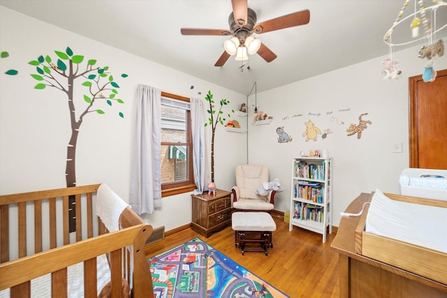3820 Lombard Ave, Berwyn, IL 60402 - bedroom featuring wood finished floors and ceiling fan