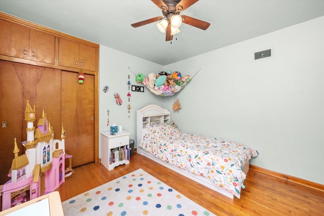 3820 Lombard Ave, Berwyn, IL 60402 - bedroom featuring light wood-style flooring and ceiling fan