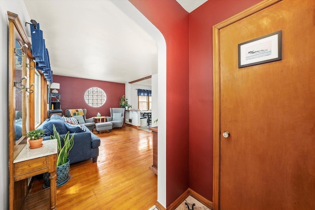 3820 Lombard Ave, Berwyn, IL 60402 - corridor with light wood-style flooring and arched walkways