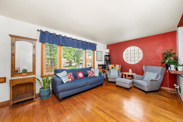 3820 Lombard Ave, Berwyn, IL 60402 - living room featuring wood finished floors and an accent wall