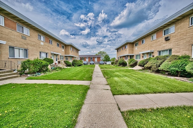 9666 Lois Dr Unit D, Des Plaines, IL 60016 - surrounding community featuring a residential view and a yard
