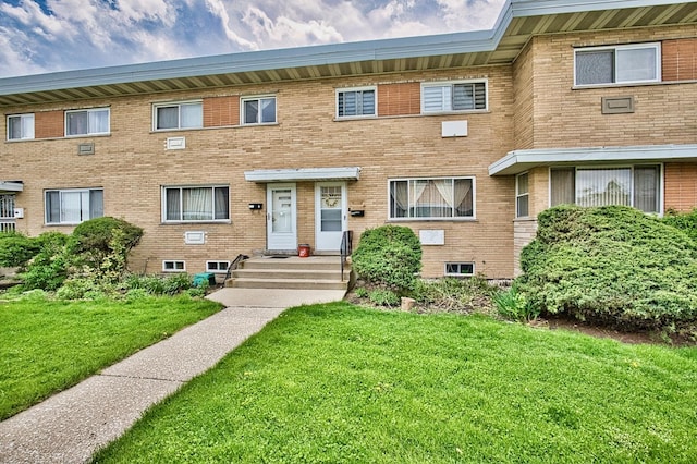 9666 Lois Dr Unit D, Des Plaines, IL 60016 - multi unit property with a front yard and brick siding