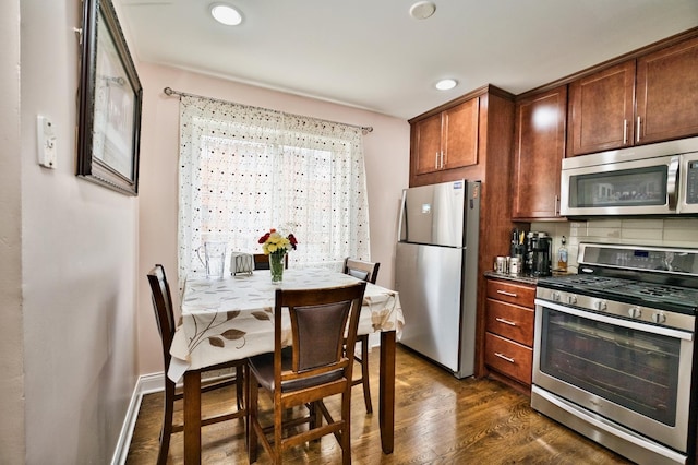 9666 Lois Dr Unit D, Des Plaines, IL 60016 - kitchen featuring appliances with stainless steel finishes, dark wood-style floors, recessed lighting, and decorative backsplash