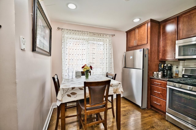9666 Lois Dr Unit D, Des Plaines, IL 60016 - kitchen featuring appliances with stainless steel finishes, dark wood-style flooring, and recessed lighting