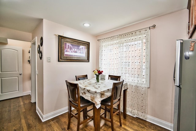 9666 Lois Dr Unit D, Des Plaines, IL 60016 - dining area with dark wood-style flooring