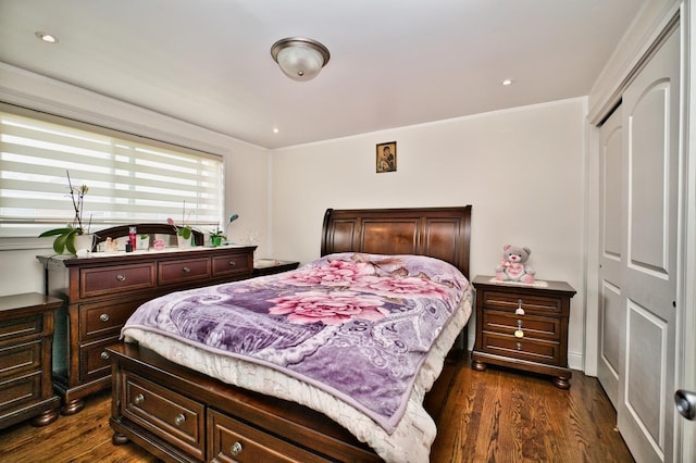 9666 Lois Dr Unit D, Des Plaines, IL 60016 - bedroom with dark wood finished floors, a closet, and crown molding