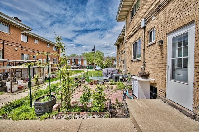 9666 Lois Dr Unit D, Des Plaines, IL 60016 - view of yard with a residential view and a patio area