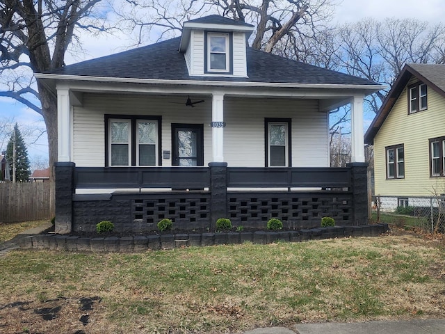 1035 S Osborn Ave, Kankakee, IL 60901 - view of front facade featuring a porch and a shingled roof
