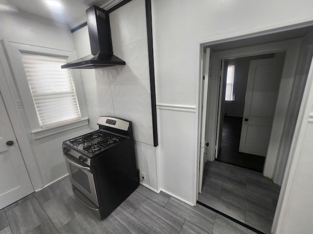 1035 S Osborn Ave, Kankakee, IL 60901 - kitchen featuring gas range, wall chimney exhaust hood, and crown molding