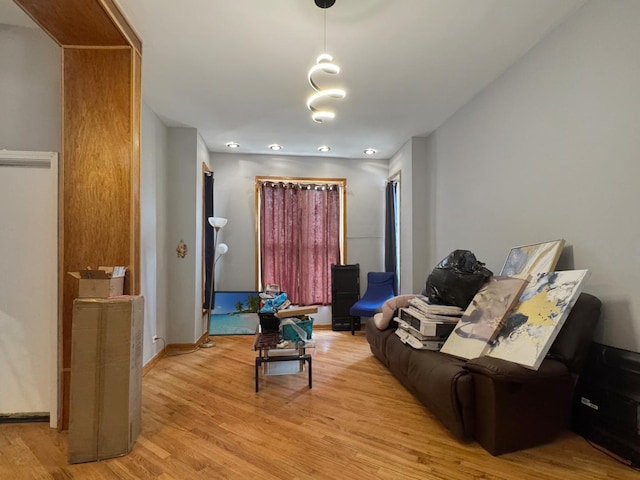 5943 S Indiana Ave, Chicago, IL 60637 - living room featuring light wood-type flooring and baseboards