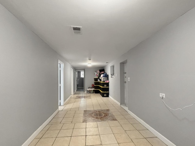 5943 S Indiana Ave, Chicago, IL 60637 - hallway with light tile patterned flooring and baseboards