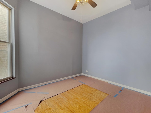 5943 S Indiana Ave, Chicago, IL 60637 - spare room featuring ceiling fan and healthy amount of natural light
