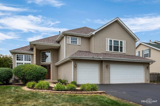 24209 Lavergne St, Plainfield, IL 60585 - view of front of property featuring a garage, driveway, and a shingled roof