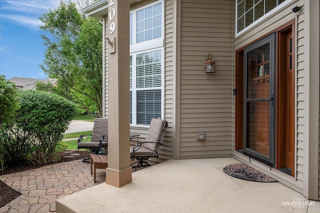 24209 Lavergne St, Plainfield, IL 60585 - view of exterior entry with a patio