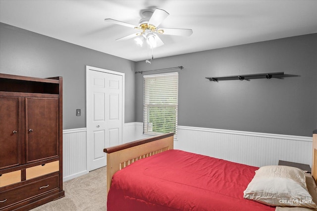 24209 Lavergne St, Plainfield, IL 60585 - bedroom with wainscoting, light carpet, and a ceiling fan