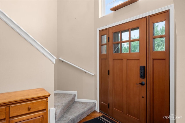 24209 Lavergne St, Plainfield, IL 60585 - foyer featuring stairs, healthy amount of natural light, and wood finished floors