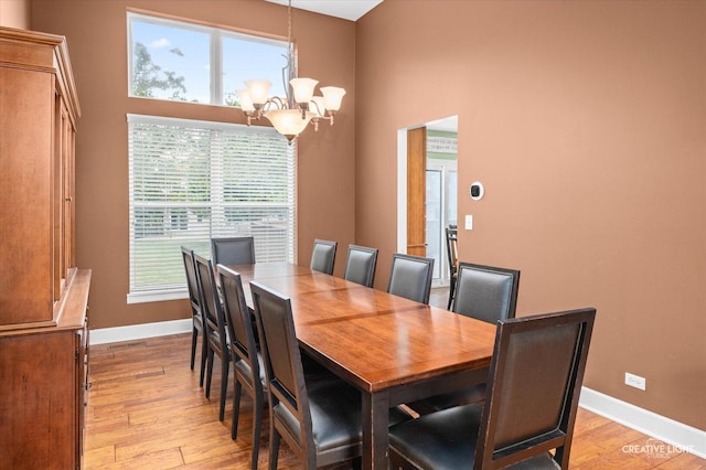 24209 Lavergne St, Plainfield, IL 60585 - dining area featuring a chandelier, light wood-style flooring, and plenty of natural light
