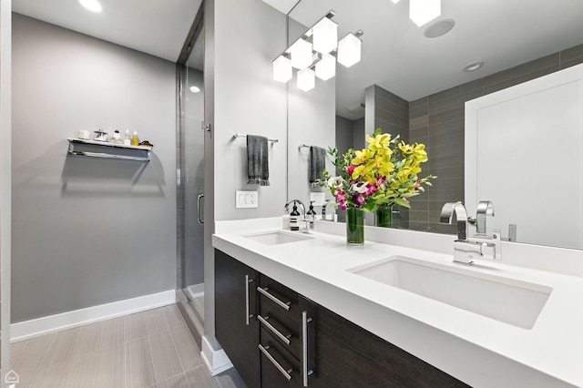 1312 W Madison St Unit 3A, Chicago, IL 60607 - full bath featuring double vanity, a shower stall, and recessed lighting