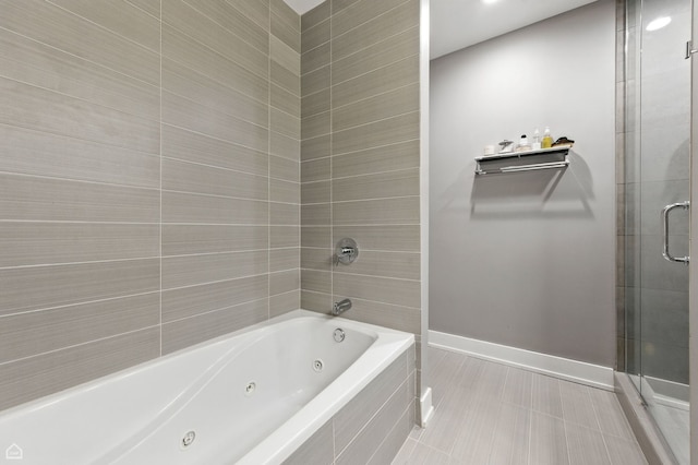 1312 W Madison St Unit 3A, Chicago, IL 60607 - full bath with a tile shower and a tub with jets