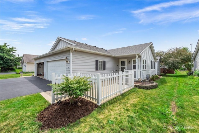 40 S Juniper Dr, North Aurora, IL 60542 - view of home's exterior featuring an attached garage and a shingled roof