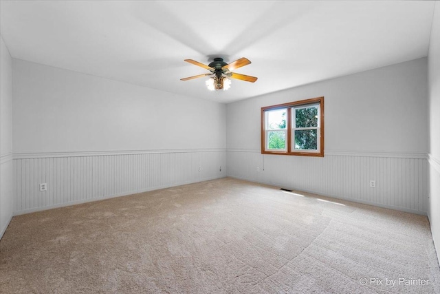 40 S Juniper Dr, North Aurora, IL 60542 - spare room with a ceiling fan and carpet floors