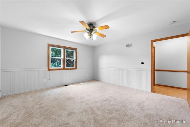 40 S Juniper Dr, North Aurora, IL 60542 - carpeted spare room with ceiling fan