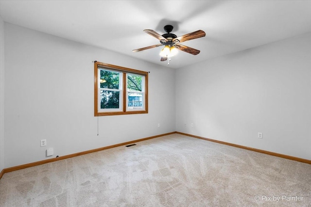 40 S Juniper Dr, North Aurora, IL 60542 - carpeted spare room featuring baseboards and a ceiling fan
